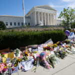 Image of the altar laid outside of the Supreme Court for Ruth Bader Ginsburg.