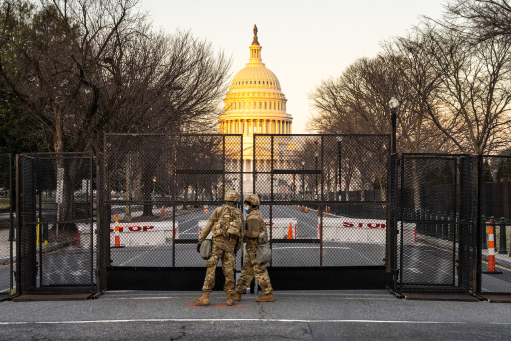 Two members of the National Guard stand outside the U.S. Capitol before the Inauguration of Joe Biden.