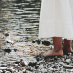 Bare feet on a stony bank