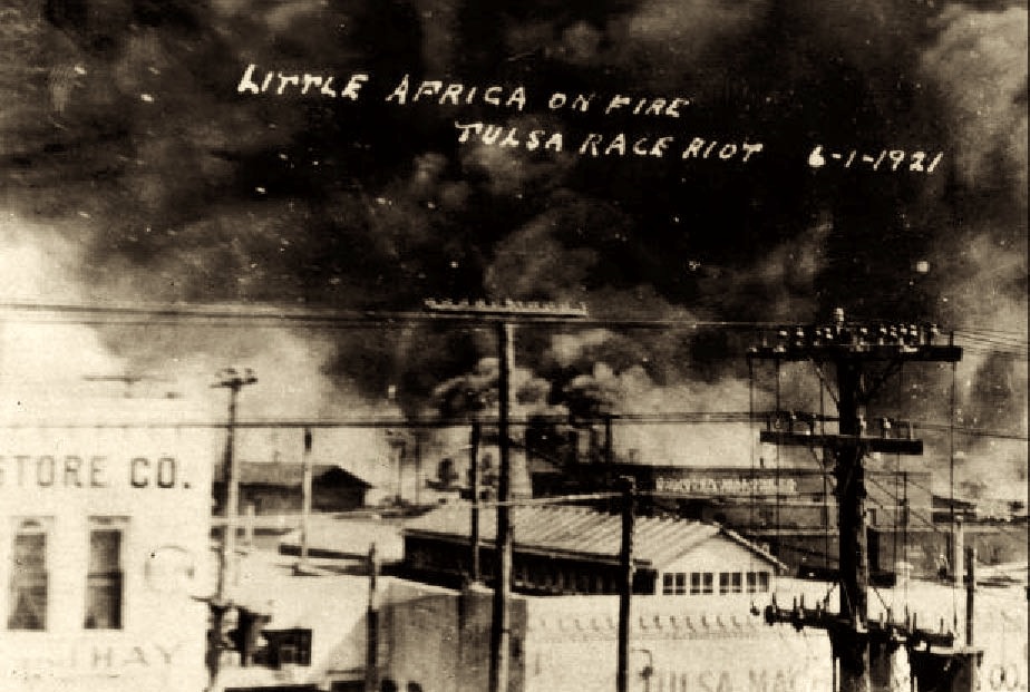 A photo of the fi. Text reads 'Little Africa on fire. Tulsa Race Riot, June 1st, 1921'